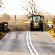 Tractor on road, stock image.