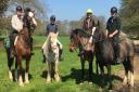 Four riders and their mounts ready for a Dorset adventure