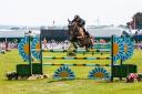 A showjumper clears a fence Picture Roland Ebert