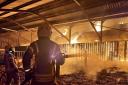 FIREFIGHTERS battled throughout the night to contain a large barn blaze.