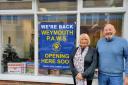 Store manager Linda Richards and PAWS chairman Lionel Knibbs in front of the almost ready new shop on Great George Street