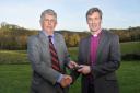The Rt Revd Tim Thornton, Bishop of Truro is presented his presidential badge of office by Royal Cornwall Agricultural Association Chairman, Michael Williams