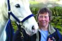 Jeni Gilbert with her grey Connemara-type horse, Flurrie