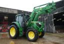 The 2016 John Deere 6120M 4WD tractor c/w loader sold for £54,000