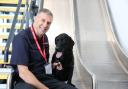 Martyn Bolt with Fire Investigation Dog Jet. Picture: Avon Fire & Rescue Service