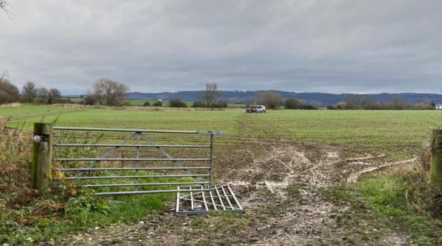 South West Farmer: The damaged gate and field. Picture: Gloucestershire Police