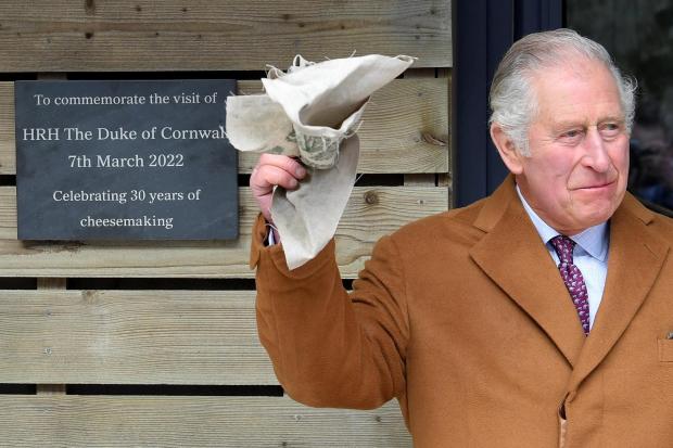 South West Farmer: The Prince of Wales reacts after unveiling a plaque during the visit. Picture: PA Images