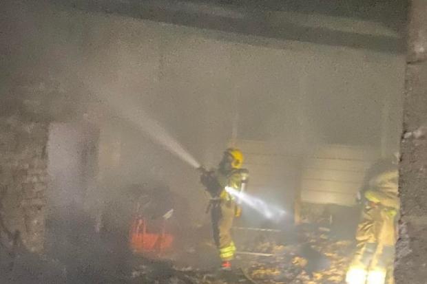 Firefighters tackling the fire last night. Picture: Chew Magna Fire Station