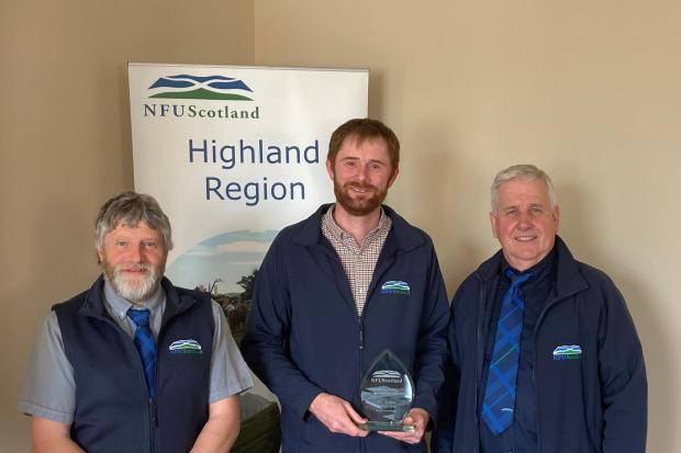 Jonathan Hogg received his award from NFU Scotland president Martin Kennedy and regional chair Cameron Maciver