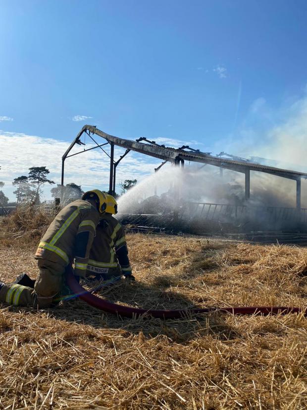 South West Farmer: Firefighters tackle the fire. Picture: Verwood Fire Station