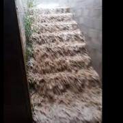 Flood water pours down the steps on Monday    Picture: Hayward Farm Cider