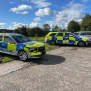 The police cars damaged by being rammed by the tractor. Picture: Police Service of Northern Ireland