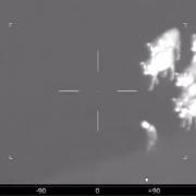 The police helicopter video shows the wanted man being chased by cows