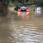 Driver rescued from car submerged in floodwater near Bedminster this morning