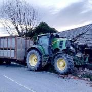 The stolen tractor and trailer crashed into a farm building in Abermule on May 16 2022