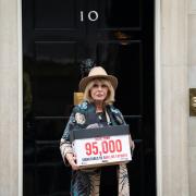 Actress Joanna Lumley hands in a petition to 10 Downing Street, London, calling for a ban on the export of live animals.