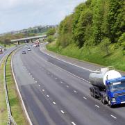 Milk tanker on a UK road (stock image).