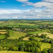 A Somerset MP has accused the Environment Agency of carrying a 'hidden agenda' against local farmers.