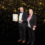Young Farmer of the Year Tom Stinton with sponsor Pam Johns from Coodes solicitors.