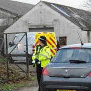 A police investigation is taking place at farm buildings on the Ashton Road near Hilperton.