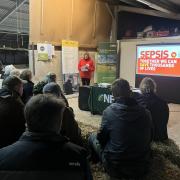 Visitors listening to a presentation at the farm safety day.