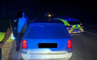 Dorset Police stopping a car as they increase their patrols to counter poaching and rural crimes